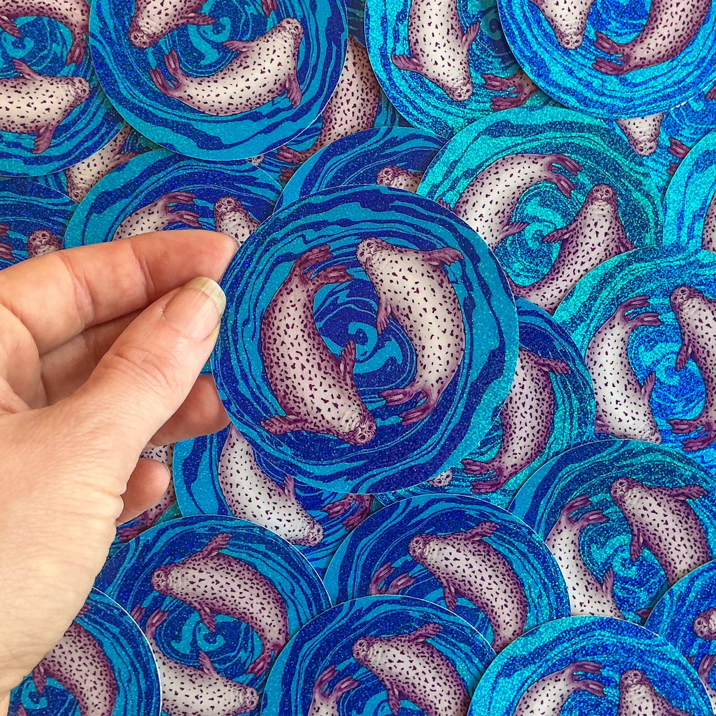 Swimming seals glitter sticker